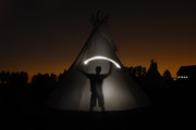 Tipi and torch at th